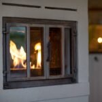 Vauni RE:Burn large vue latérale brûleur RE:Burn design noir inox