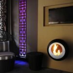 Ambiance salon avec cheminée murale Cocoon Vellum allumée